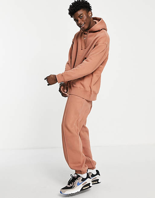 Hombre Sudaderas con y sin Capucha Deportivas | Sudadera marrón extragrande con capucha de felpa Unisex Trend de Nike - HY12960