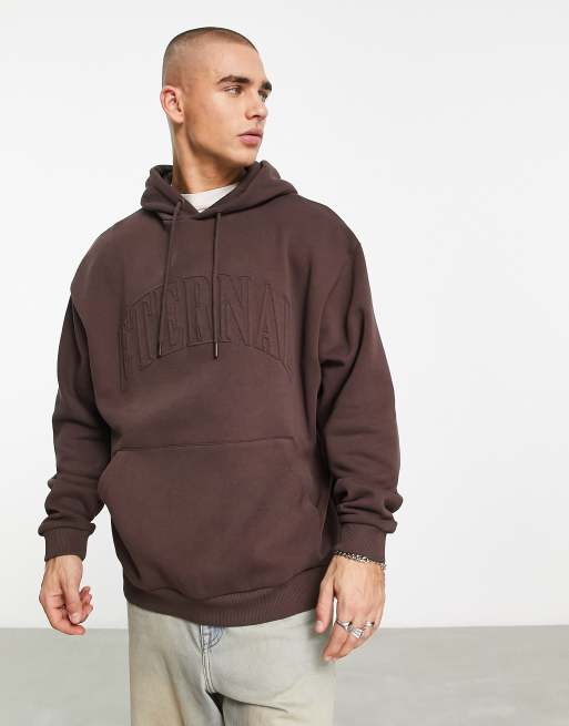 Sudadera marrón extragrande con capucha y texto en relieve de ASOS DESIGN