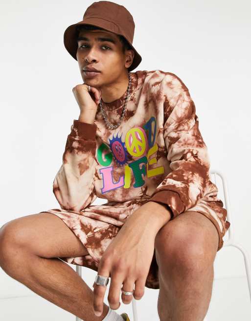 Conjunto marrón efecto tie dye extragrande con estampado de texto positivo de ASOS DESIGN, 2 de 3