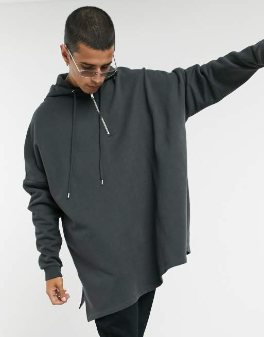 Sudadera muy extragrande con capucha y media cremallera en negro desgastado de ASOS DESIGN