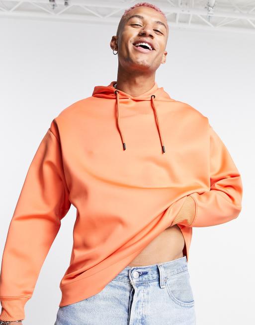 Sudadera naranja coral extragrande con capucha de tejido efecto neopreno de ASOS DESIGN