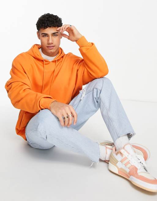 Sudadera naranja extragrande con capucha de ASOS DESIGN