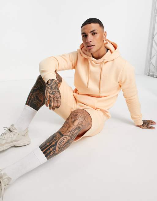 Sudadera naranja pálido con capucha y trébol Marshmallow de adidas Originals
