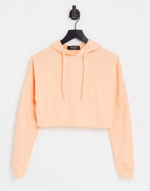 Sudadera naranja pastel con capucha de VAI21 parte de un conjunto