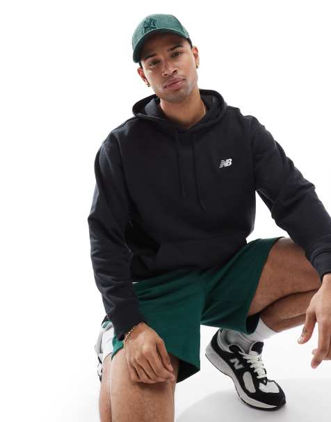 Sudadera negra básica con capucha de felpa de rizo Sport Essentials de New Balance - view 1