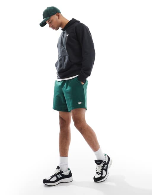 Sudadera negra básica con capucha de felpa de rizo Sport Essentials de New Balance, 2 de 4