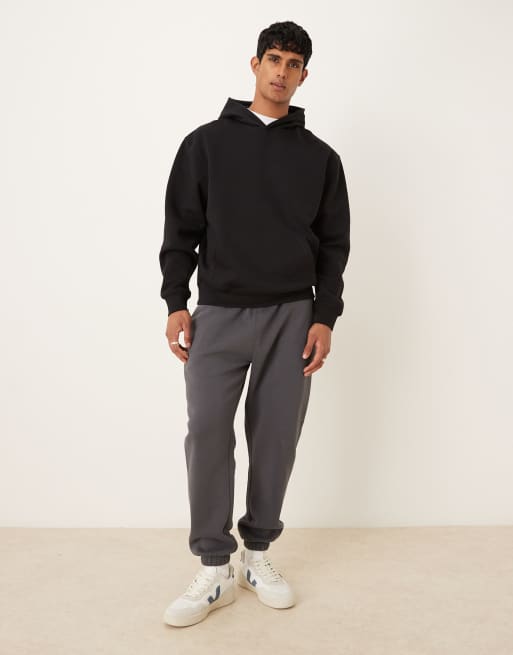Sudadera negra básica holgada con capucha de ASOS DESIGN , 2 de 5