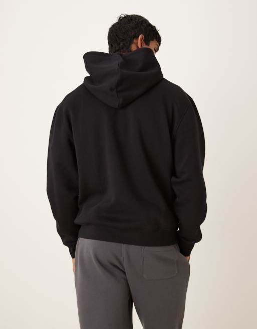 Sudadera negra básica holgada con capucha de ASOS DESIGN , 3 de 5