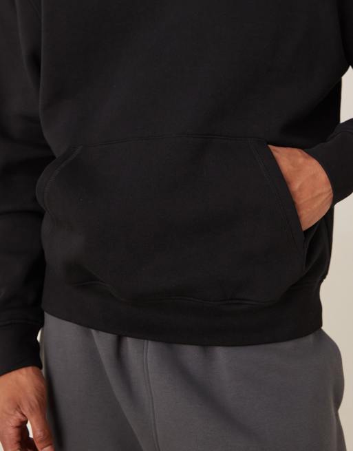 Sudadera negra básica holgada con capucha de ASOS DESIGN , 5 de 5