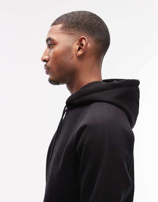 Sudadera negra con capucha de tejido grueso Chase de Carhartt WIP, 4 de 5