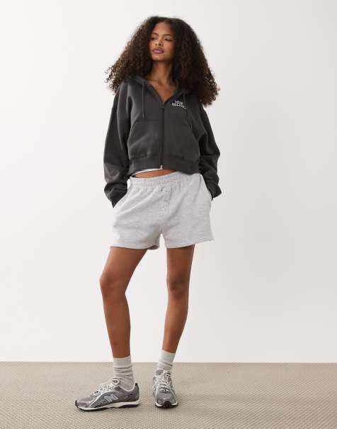 Sudadera negra con capucha y cremallera de felpa Trackside de New Balance - view 1