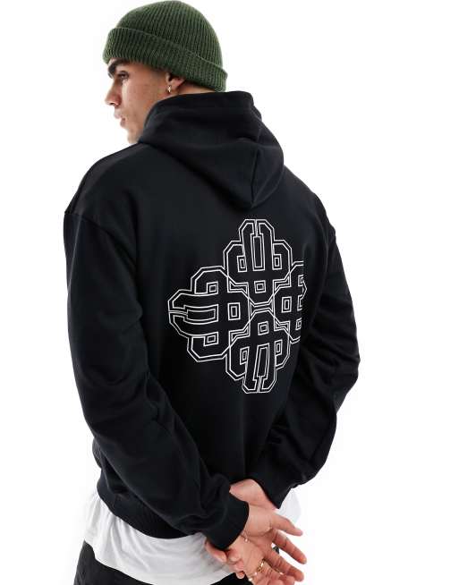 Sudadera negra con capucha y emblema de The Couture Club
