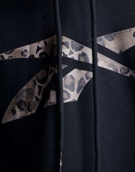 Reebok negras leopardo sales