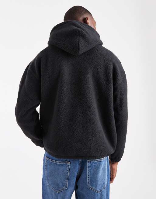 Sudadera negra con capucha y logo en el mismo tono de borreguito de Levi's, 3 de 5