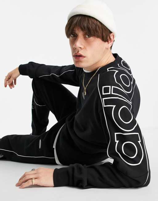 negra con logo en la manga RYV de adidas Originals ASOS