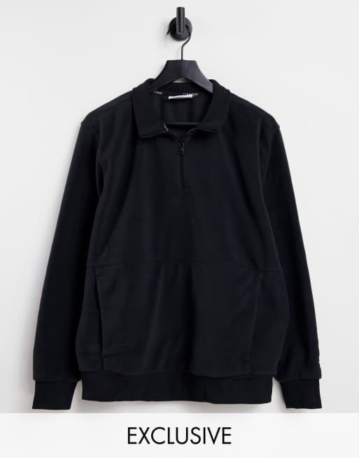Sudadera negra con media cremallera de forro polar exclusiva en ASOS de Calvin Klein