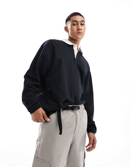 Sudadera negra estilo rugby de corte extragrande con cuello tipo polo de ASOS DESIGN