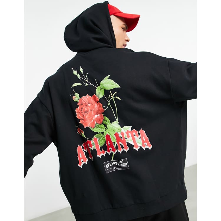 Sudadera negra con rosa shop