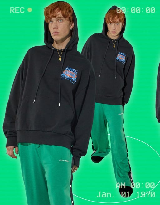 Sudadera negra extragrande con capucha y estampado de tatuajes de COLLUSION Unisex