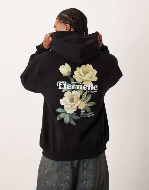 Sudadera negra extragrande con capucha y estampado floral de ASOS DESIGN