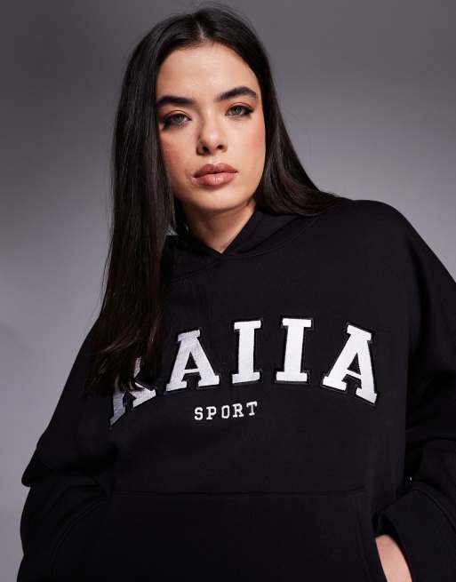 Sudadera negra extragrande con capucha y logo bordado de Kaiia Sport Plus (parte de un conjunto) 