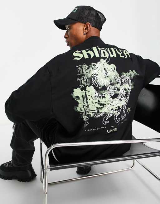 Sudadera negra extragrande con estampado de tigre en la espalda de ASOS DESIGN