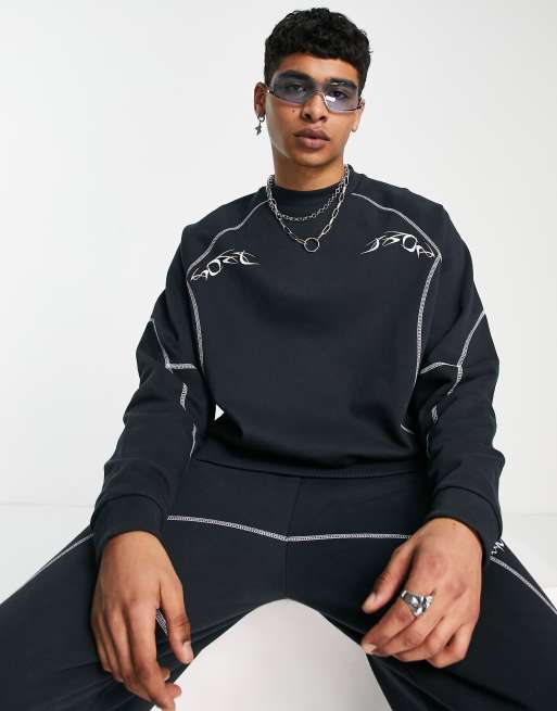 Sudadera negra extragrande con estampado estilo tatuajes y detalle de pespuntes de ASOS DESIGN (parte de un conjunto)