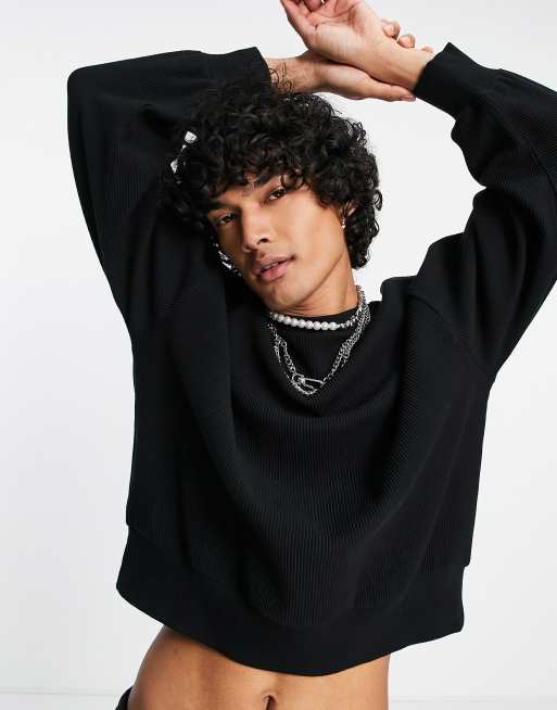 Sudadera negra extragrande con mangas exageradas de canalé de ASOS DESIGN (parte de un conjunto)