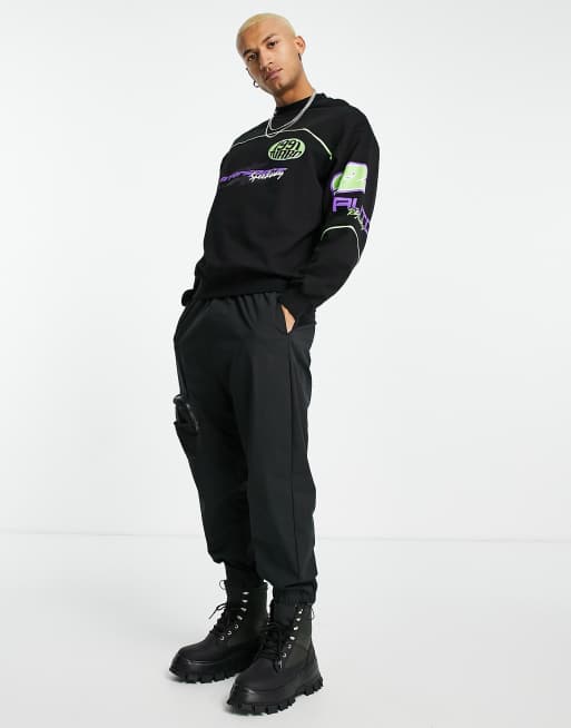 Sudadera negra extragrande con ribetes y estampados de motocross de ASOS DESIGN, 2 de 4