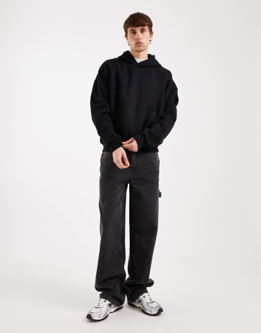 Sudadera negra holgada con capucha y detalle ajustable de Hollister, 2 de 5