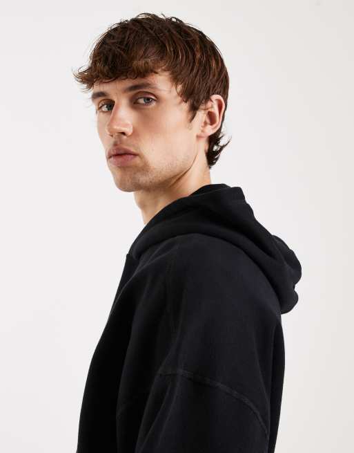 Sudadera negra holgada con capucha y detalle ajustable de Hollister, 4 de 5