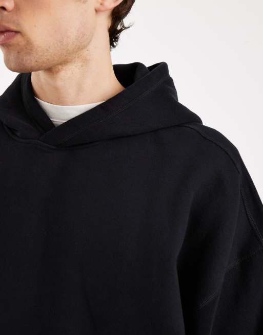 Sudadera negra holgada con capucha y detalle ajustable de Hollister, 5 de 5