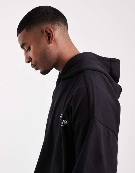 Sudadera negra holgada con capucha y estampado gráfico de Threadbare, 4 de 5