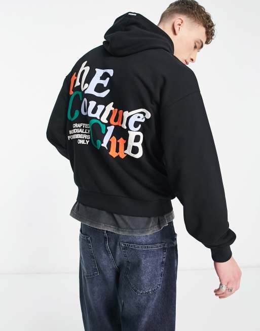 Sudadera negra sin cierres con capucha y estampado del logo en el pecho y la espalda de The Couture Club