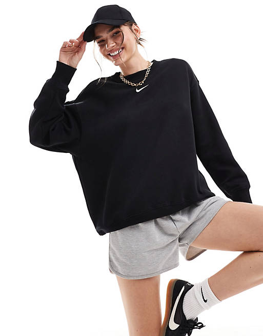 precio plan de ventas Risa Sudadera negra y blanca extragrande con cuello redondo y logo pequeño de  Nike | ASOS
