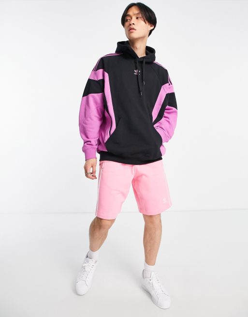 como el desayuno arena honor Sudadera negra y rosa con capucha y logo central Revive de adidas Originals  | ASOS