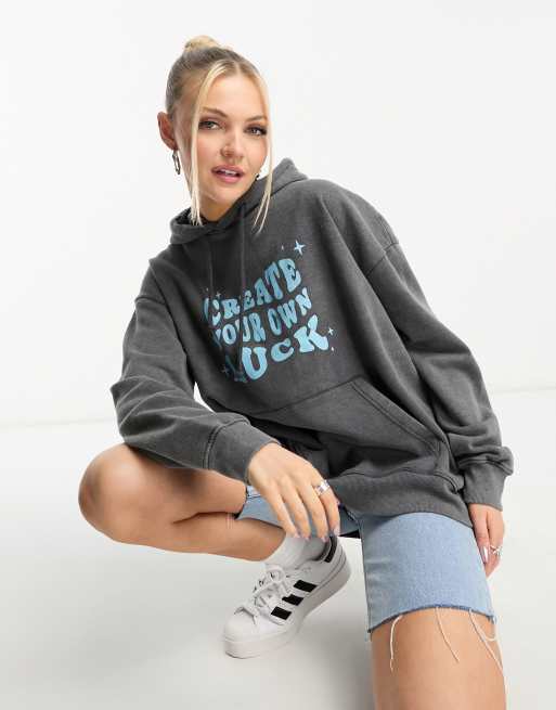 Sudadera negro lavado con capucha y estampado gráfico 