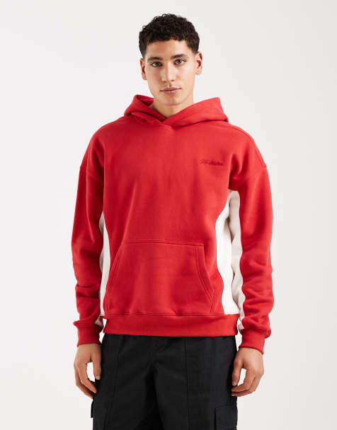 Sudadera roja con capucha, bolsillo frontal y logo en el pecho en contraste de Hollister - view 1