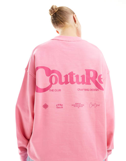 Sudadera rosa con capucha y logo de The Couture Club