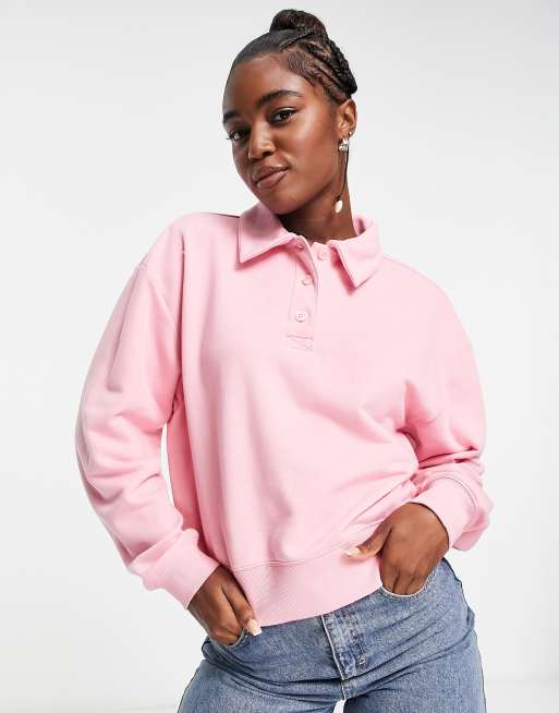 Sudadera rosa con cuello tipo polo de Monki
