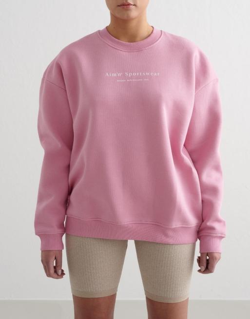 Sudadera rosa empolvado con estampado de tipografía con serifa de Aim'n