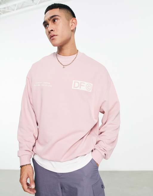 Sudadera rosa extragrande con bajo de canalé ancho y estampados del logo en el pecho y la espalda de ASOS Dark Future (parte de un conjunto)