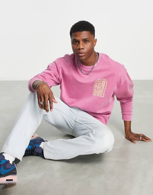 Sudadera rosa extragrande con lavado ácido y estampado en la espalda de  ASOS DESIGN | ASOS