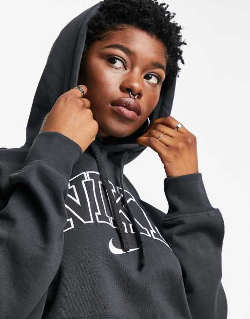 Sudadera unisex extragrande con capucha, lavado negro y logo estilo vintage de polar de Nike, 2 de 4