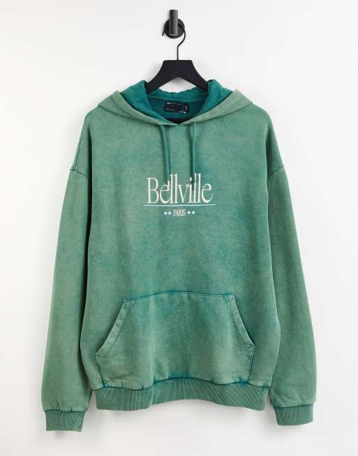 Sudadera verde extragrande con capucha, lavado ácido y estampado de ciudad en el pecho de ASOS DESIGN (parte de un conjunto)