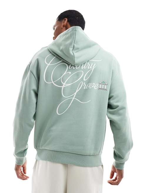 Sudadera verde extragrande con capucha y estampado 