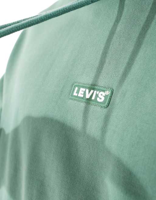 Sudadera verde holgada con capucha y etiqueta del logo en la parte central del pecho de Levi's, 4 de 4