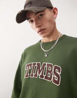 Sudadera verde oscuro con logo de texto en el pecho de bouclé de Timberland - view 1