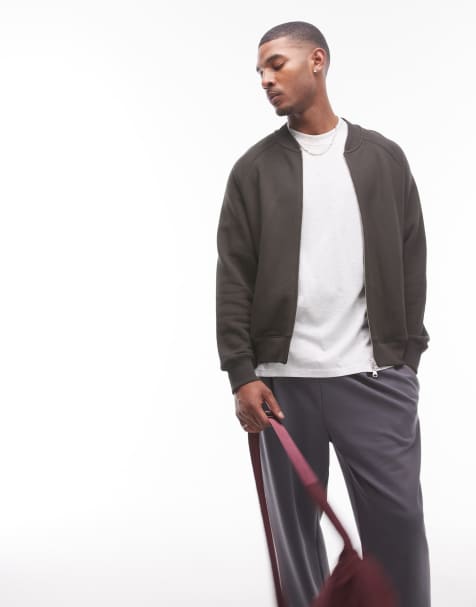 Sudadera verde oscuro estilo cárdigan con cremallera delantera de punto liso de ARKET - view 1