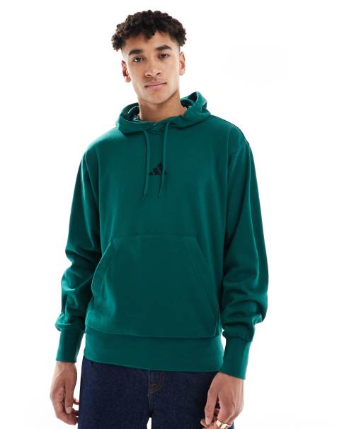 Sudadera verde universitario y negra con capucha de felpa de rizo Feelcozy de adidas Essentials - view 1